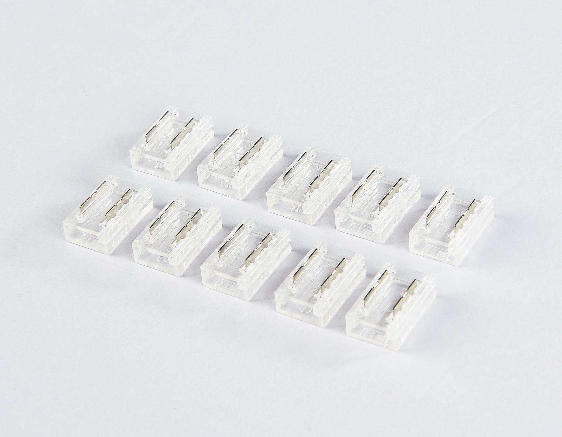 Соединитель прямой для светодиодной ленты COB 8mm 12/24V (2 конт.) GS6351 (10шт) GS6351 Соединитель прямой COB 12/24V для лент 8mm (2 конт.) (10шт) Ambrella Light 5