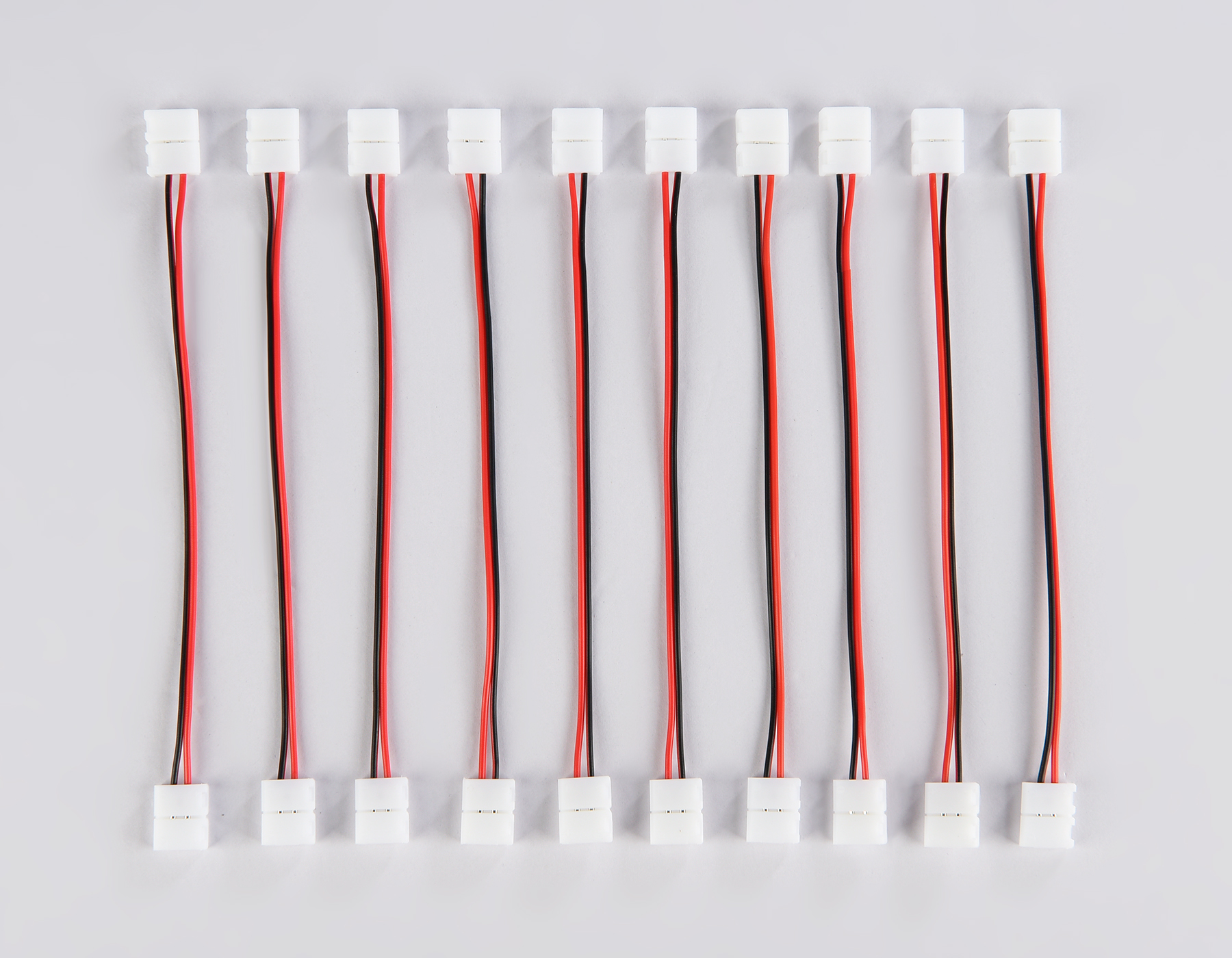 Соединитель гибкий двухсторонний для светодиодной ленты 2835 12/24V (2 конт.) 150 мм GS7551 (10шт) GS7551 Соединитель гибкий двухсторонний 2835 12/24V (2 конт.) (10шт) Ambrella Light 7